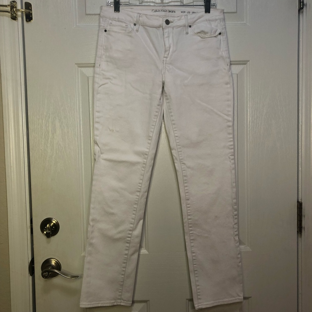 Calvin Klein low-rise white jeans, size 4